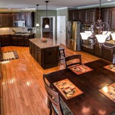 Kitchen cabinet refinishing in a rich furniture finish